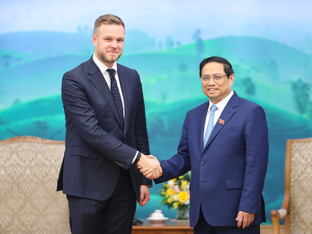 Le PM rencontre le ministre lituanien des Affaires étrangères - Ảnh 1.
